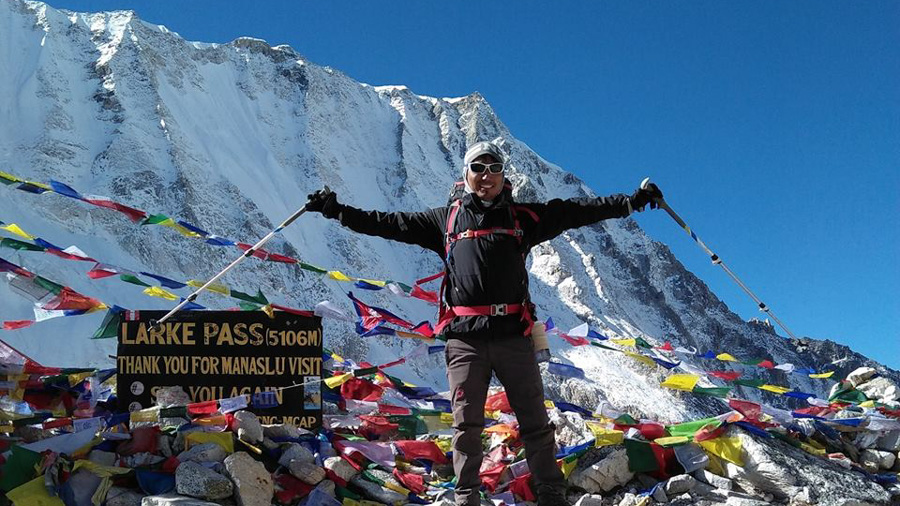 Bhim Tamang, an experienced trekking guide in Larke Pass after a successful ascent.